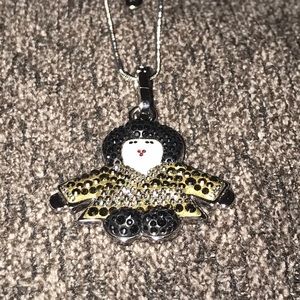 Signed Swarovski silver tone and crystal pendant.